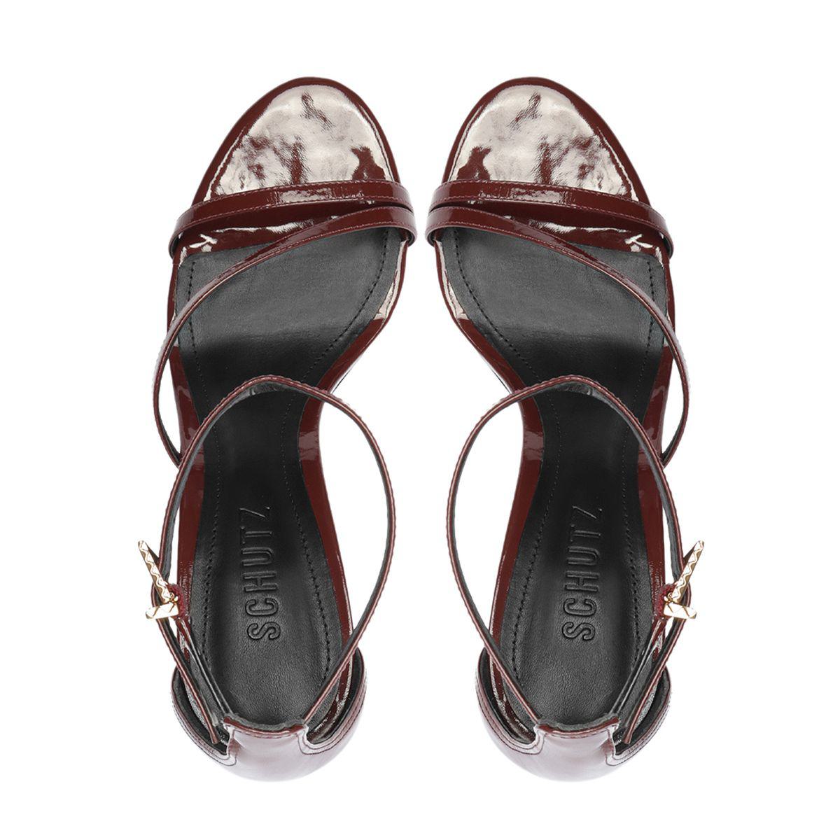 Top view of Tessa Patent Sandal in Port Burgundy showcasing glossy patent leather straps on a white background
