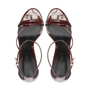 Top view of Tessa Patent Sandal in Port Burgundy showcasing glossy patent leather straps on a white background