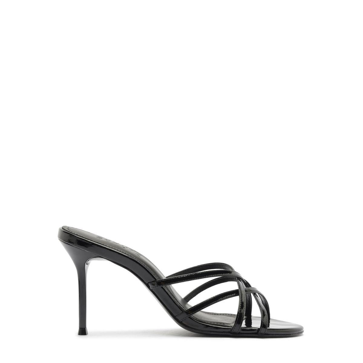 Side view of Marion Patent Sandal in Black showcasing patent leather straps and stiletto heel with white background