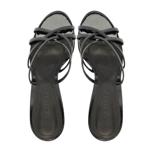 Top view of Marion Patent Sandal in Black showcasing delicate straps and open toe on a white background