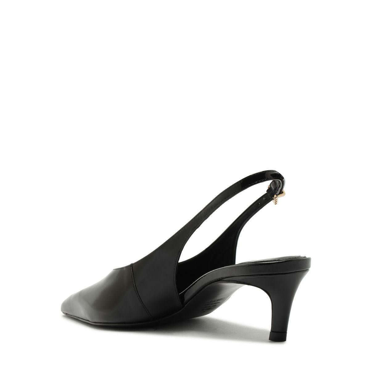 Side view of Alicia Sling Mid Patent Pump in Black showcasing its slingback strap and mid heel on a white background