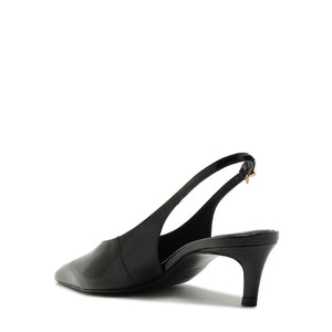 Side view of Alicia Sling Mid Patent Pump in Black showcasing its slingback strap and mid heel on a white background