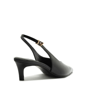 Side view of Alicia Sling Mid Patent Pump in Black showcasing its slingback strap and mid heel on a white background