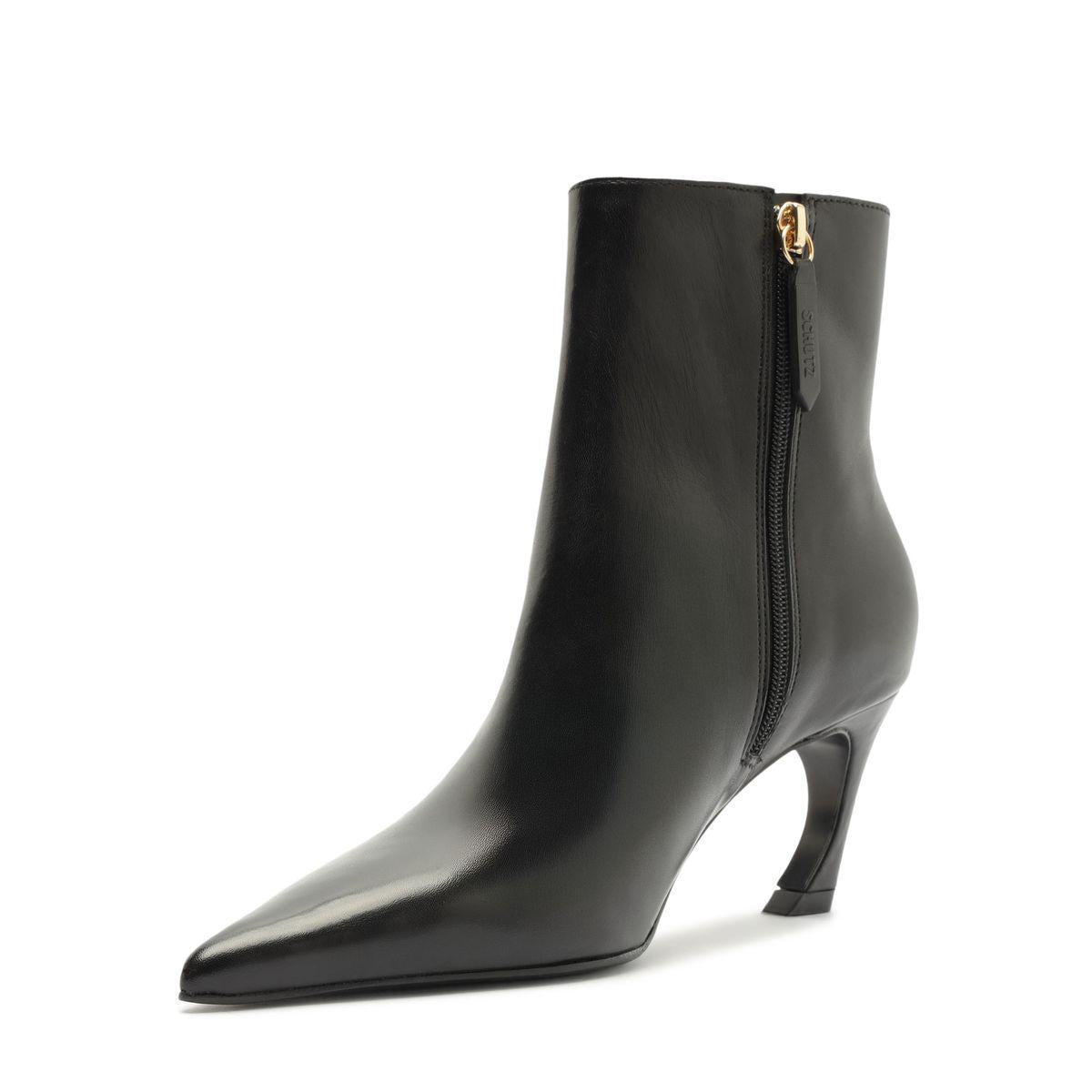 Side view of Lexi Leather Bootie in Black showcasing pointed toe and sculptural heel against a white background