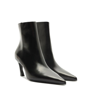 Angled view of Lexi Leather Bootie in Black showcasing pointed toes and sculptural heels on a white background