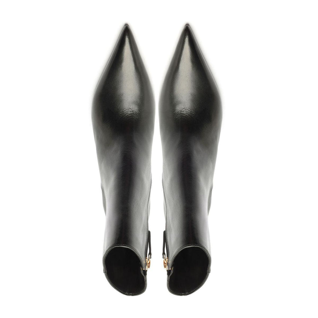 Rear view of Lexi Leather Bootie in Black showcasing sculptural heels and zip closures on a white background