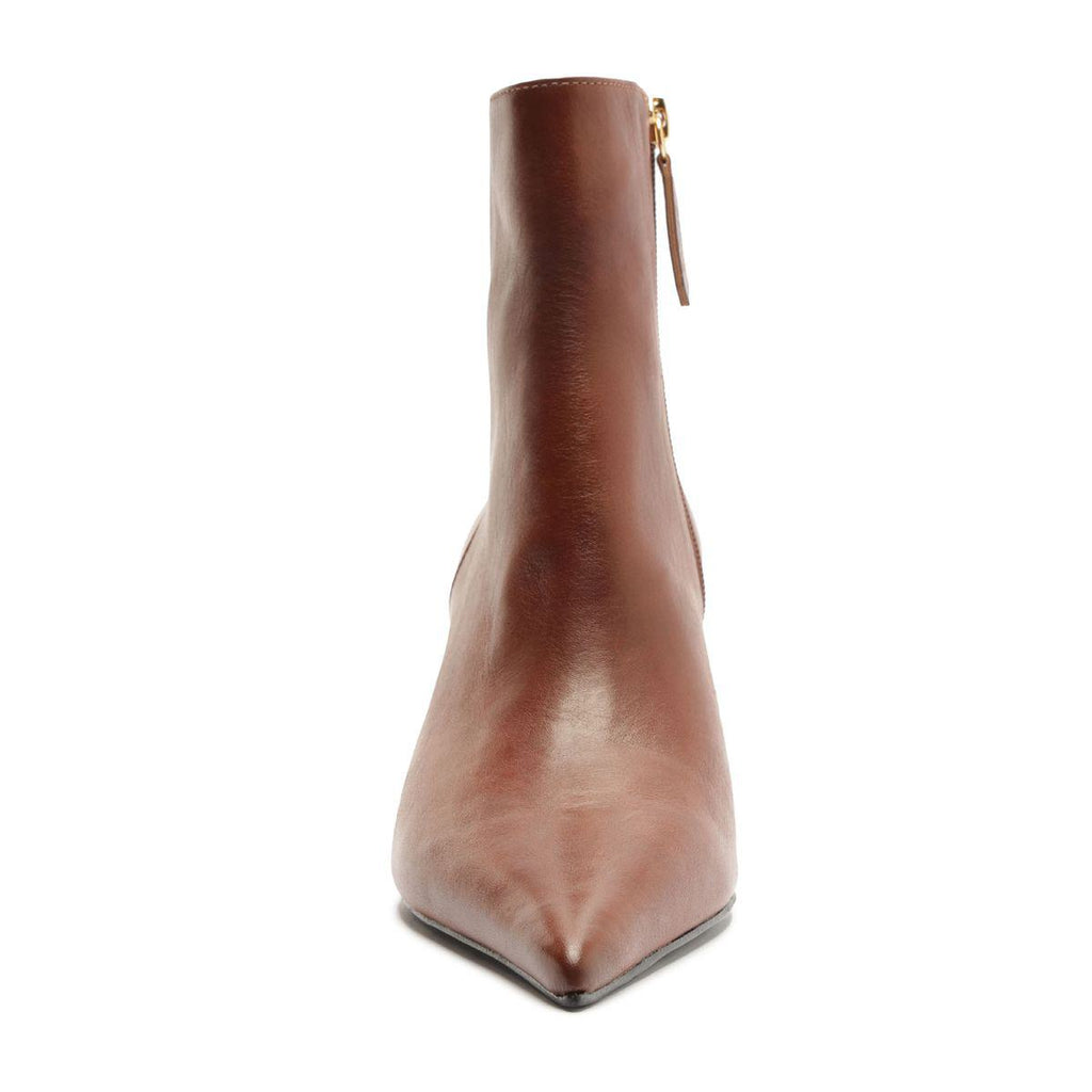 Front view of Lexi Leather Bootie in warm toffee showcasing pointed toe and side zipper against a white background