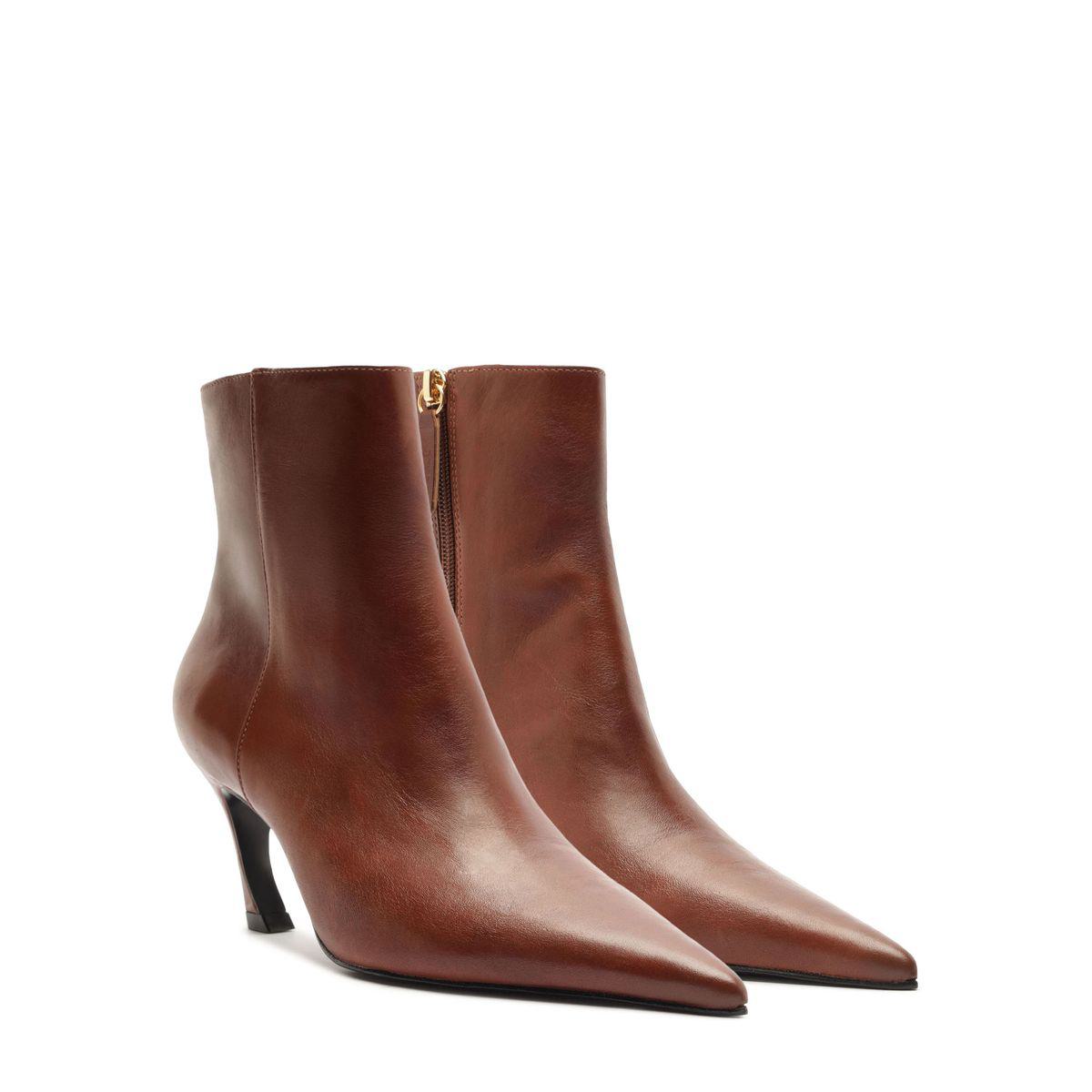 Front view of Lexi Leather Bootie in Warm Toffee showcasing pointed toes and high heels with a white background
