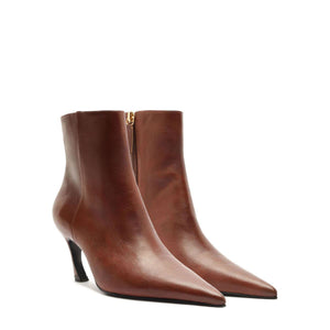 Front view of Lexi Leather Bootie in Warm Toffee showcasing pointed toes and high heels with a white background