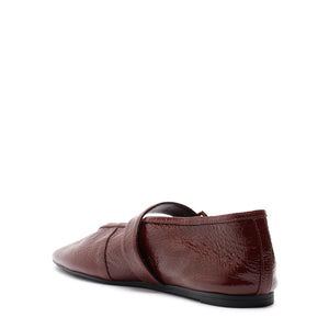 Courtney Buckle Patent Flat in Vino