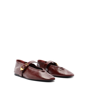 Courtney Buckle Patent Flat in Vino