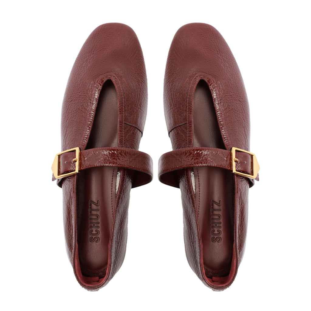 Courtney Buckle Patent Flat in Vino