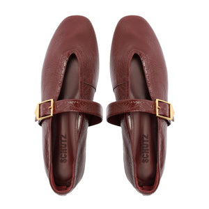 Courtney Buckle Patent Flat in Vino
