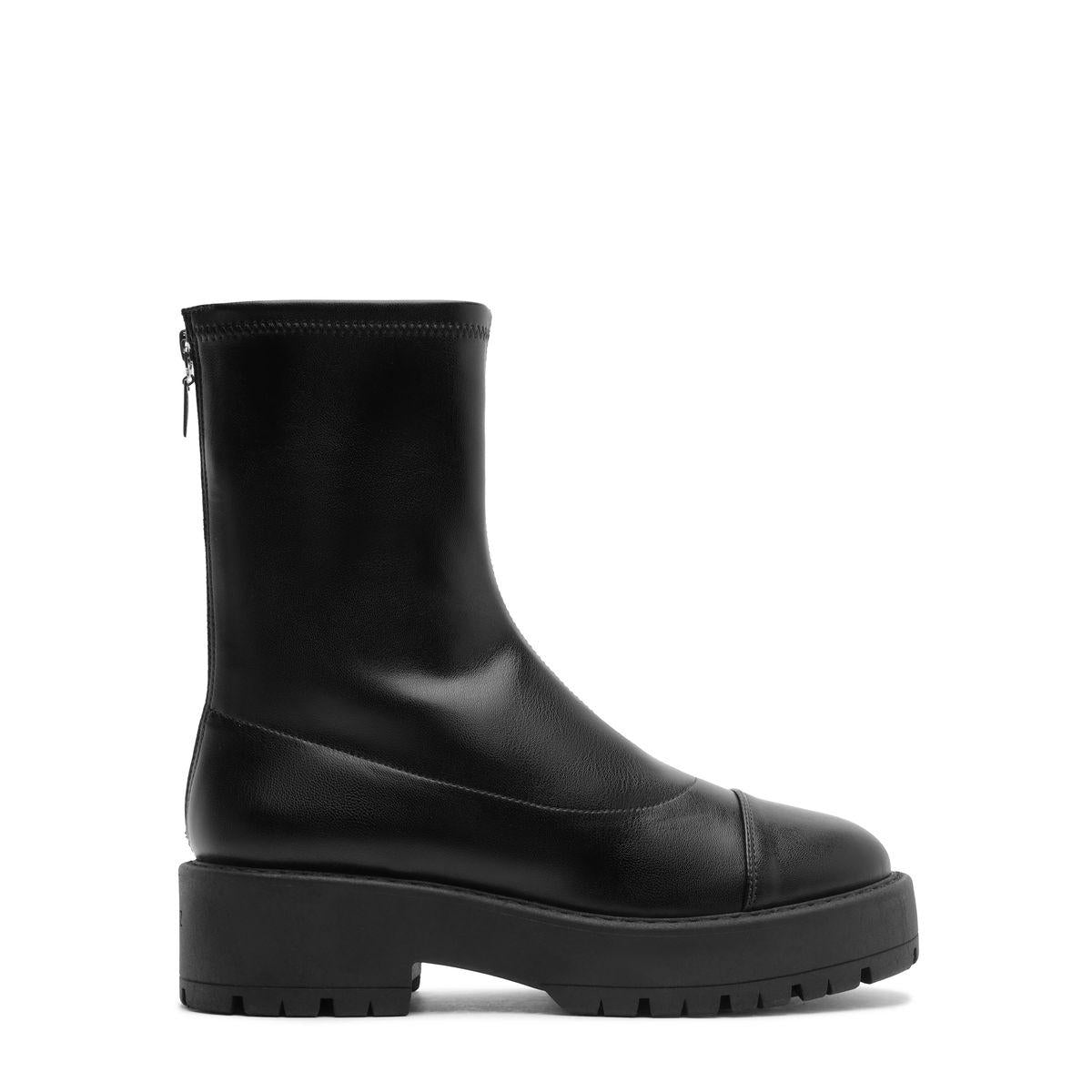 Side view of Rita Bootie in Black showcasing its round toe, zip closure, and lug sole with a white background