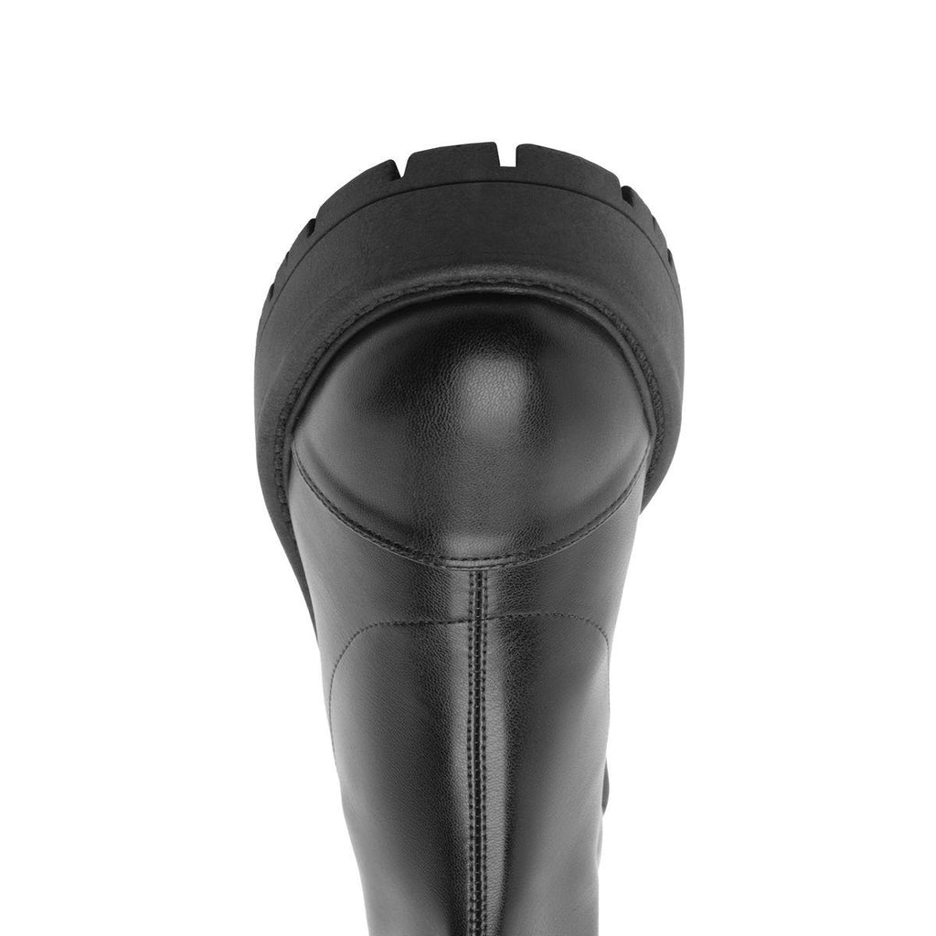 Top view of black Rita bootie showcasing rounded toe and lug sole against a white background
