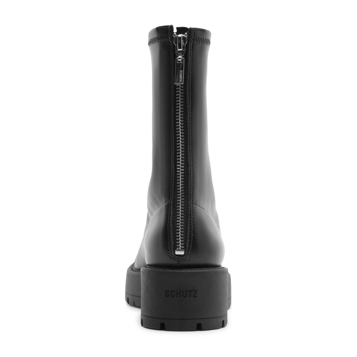 Rear view of Rita Bootie in Black showcasing its rear zip closure and lug sole with a white background