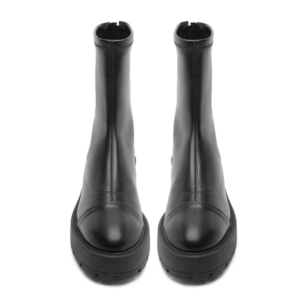 Front view of black Rita booties showcasing round toes and lug soles with a white background