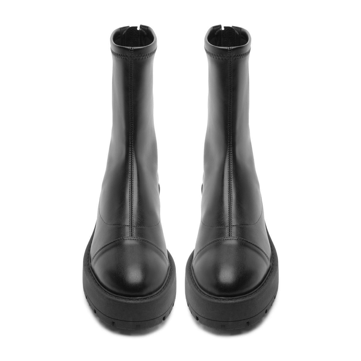 Front view of black Rita booties showcasing round toes and lug soles with a white background