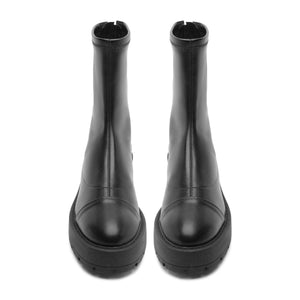 Front view of black Rita booties showcasing round toes and lug soles with a white background