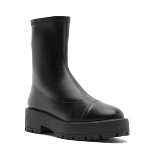 Front three-quarter view of black Rita Bootie showcasing its rounded toe and lug sole against a white background