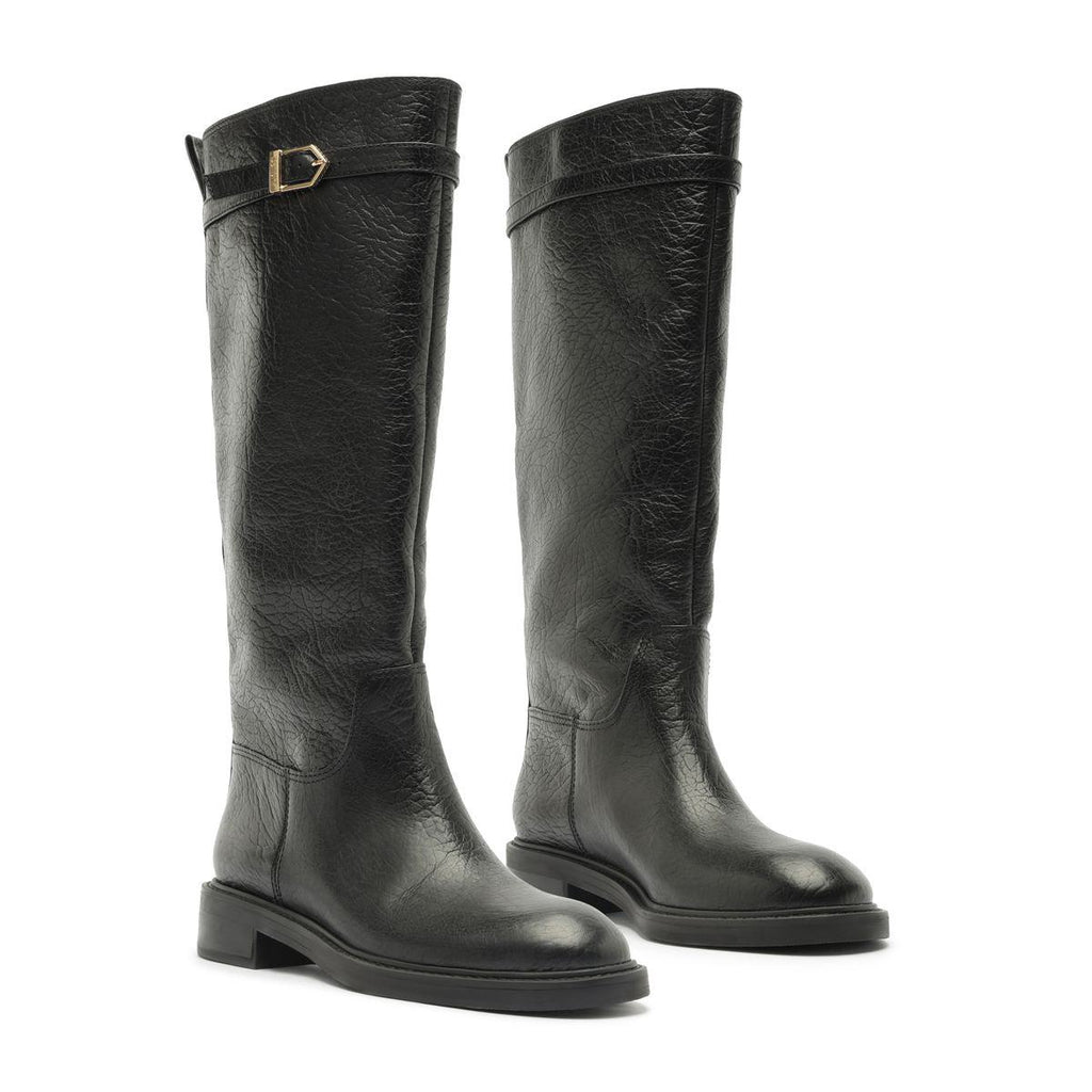 Three-quarter view of the Bianca leather boots in black showcasing knee-high shafts, rounded toes, and low block heels