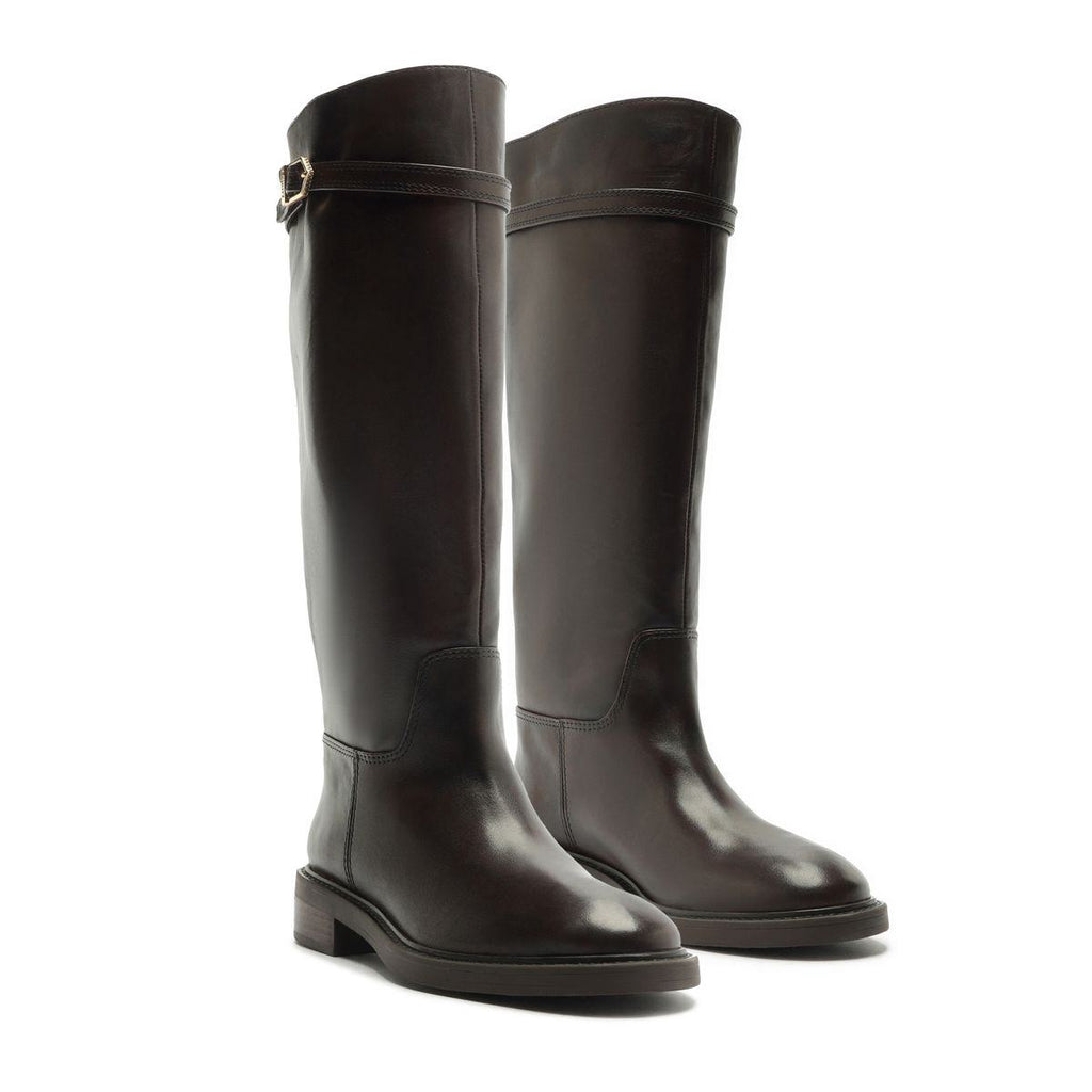 Front three-quarter view of Bianca leather boots in Maplewood showcasing tall shafts and side buckles with a white background
