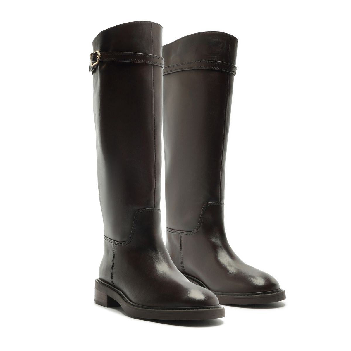 Front three-quarter view of Bianca leather boots in Maplewood showcasing tall shafts and side buckles with a white background
