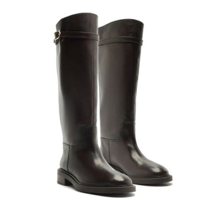 Front three-quarter view of Bianca leather boots in Maplewood showcasing tall shafts and side buckles with a white background