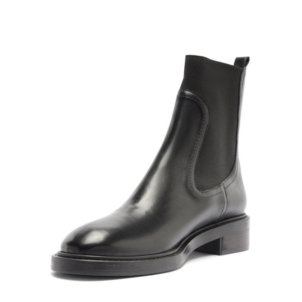 Front three-quarter view of Olivia Bootie in black showcasing an elastic side panel and block heel against a white background