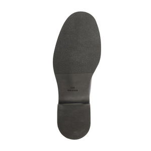 Bottom view of Olivia Bootie in Black showcasing the textured sole against a white background