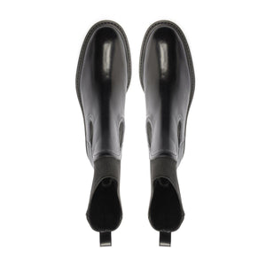 Rear view of Olivia Bootie in Black showcasing pull tabs with a white background