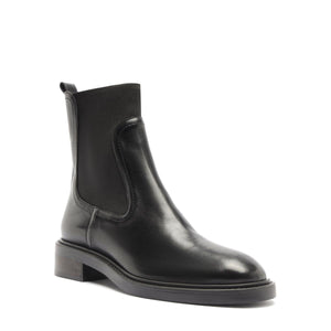 Three-quarter view of Olivia Bootie in Black showcasing its ankle-height shaft and low block heel against a white background