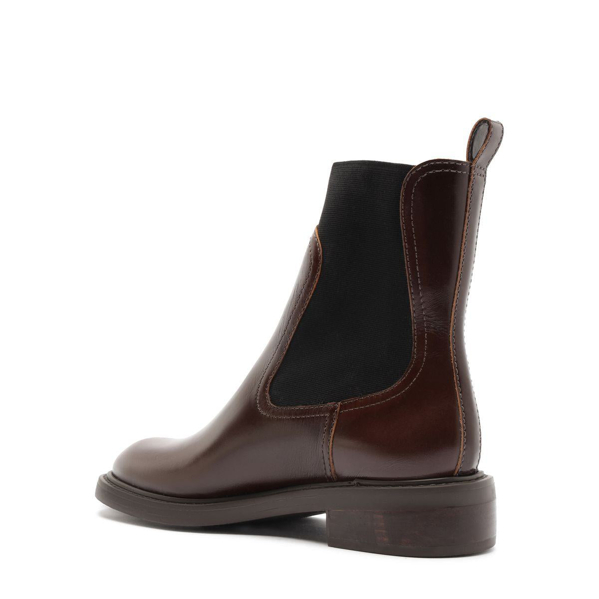 Side view of Olivia Bootie in Root Brown showcasing elastic side panel and block heel with white background