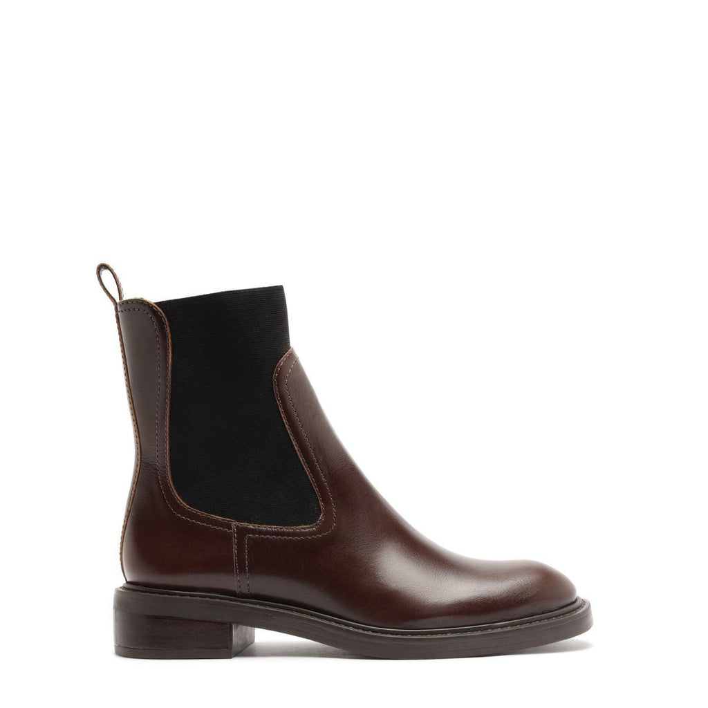 Side view of Olivia Bootie in Root Brown showcasing a black elastic side panel and low block heel on a white background
