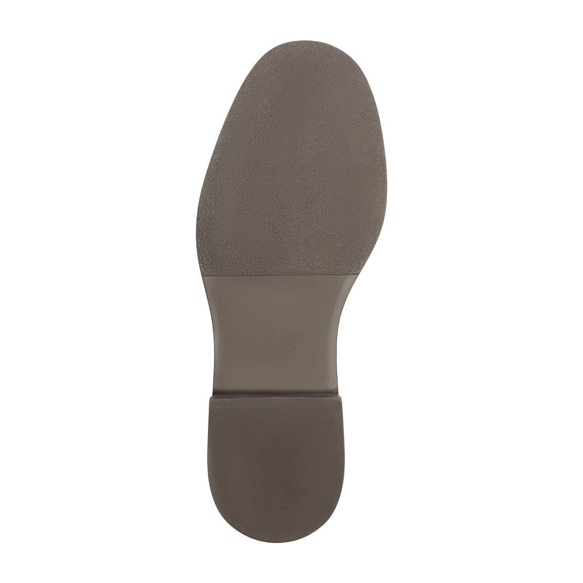 Bottom view of Olivia Bootie in Root Brown showcasing the outsole with a white background