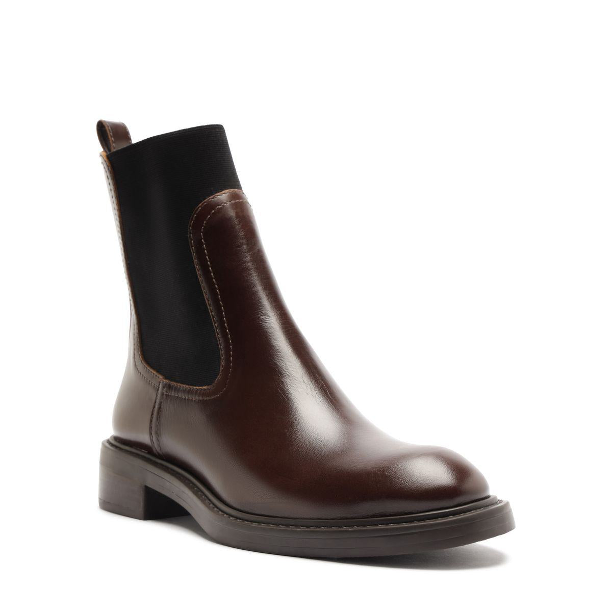 Front three-quarter view of Olivia Bootie in Root Brown showcasing side elastic panels and a block heel against a white background
