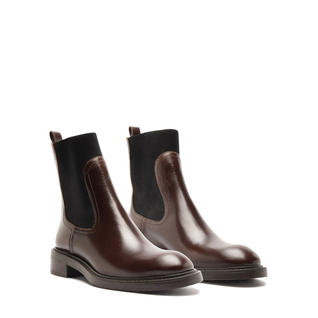Front three-quarter view of Olivia Bootie in Root Brown showcasing elastic side panels with a white background