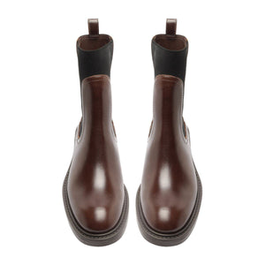 Rear view of Olivia Bootie in Root Brown showcasing pull tabs and stacked soles on a white background
