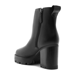 Rear three-quarter view of 240 Leather Bootie in Black showcasing a side zipper, platform sole, and block heel with a white background