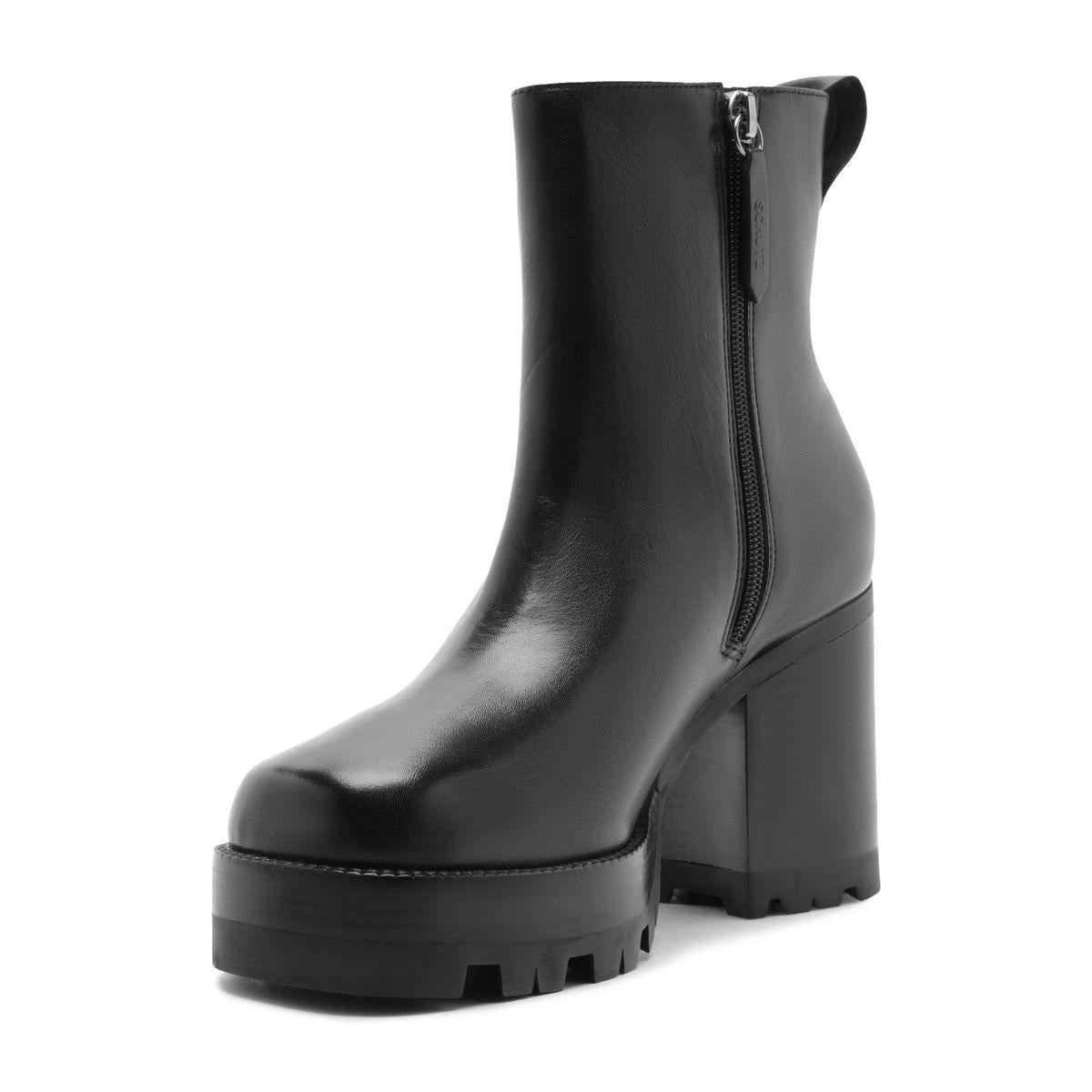 Three-quarter view of 240 Leather Bootie in black showcasing platform sole, block heel, and side zipper on white background