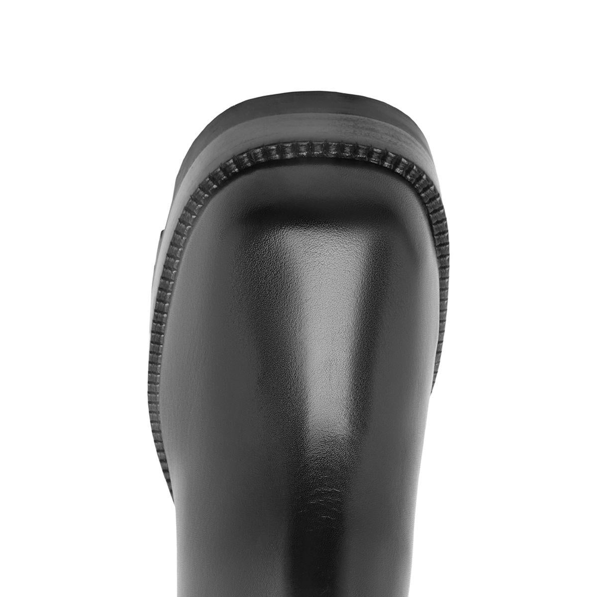 Close-up top view of 240 black leather bootie showcasing smooth leather upper and ridged sole edge with white background