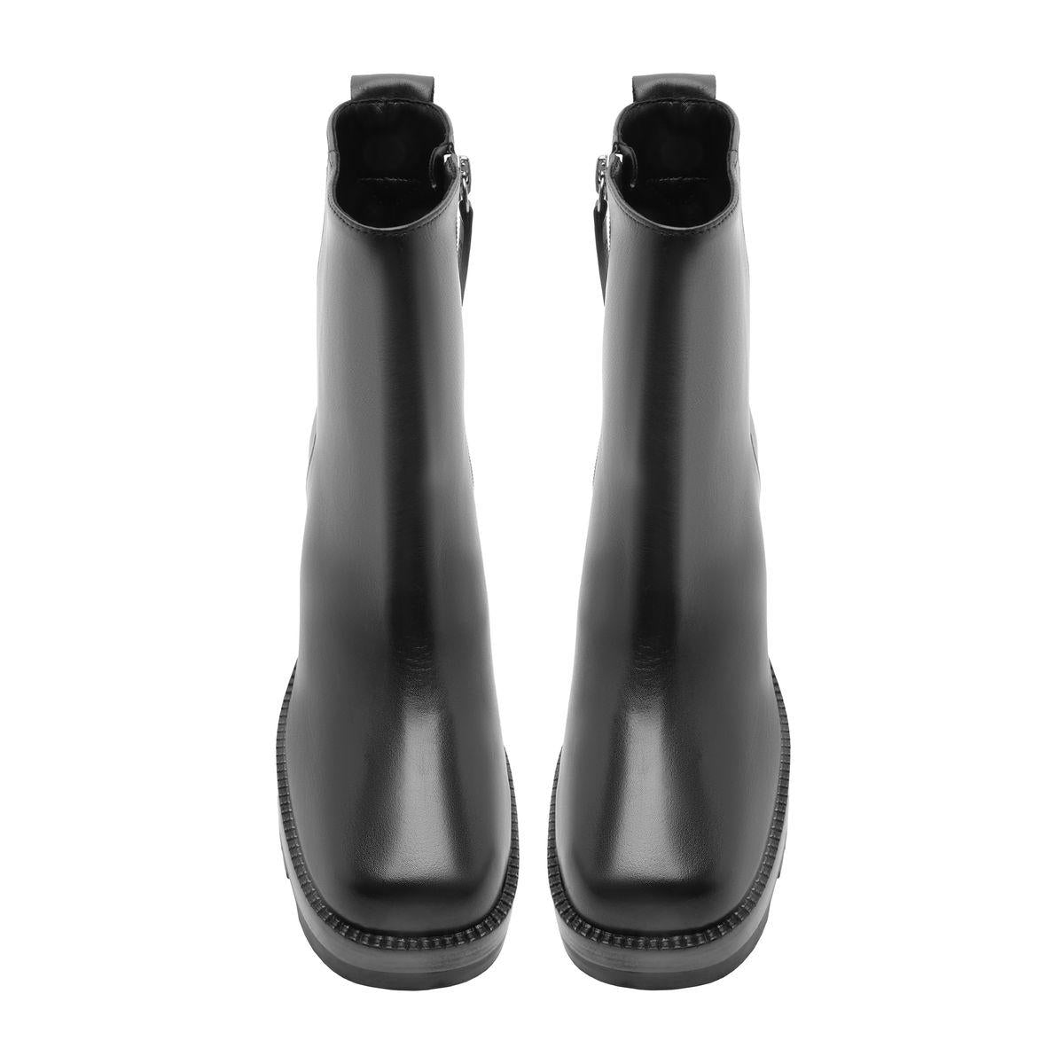 Rear view of 240 Leather Bootie in Black showcasing tall shafts and lugged soles against a white background