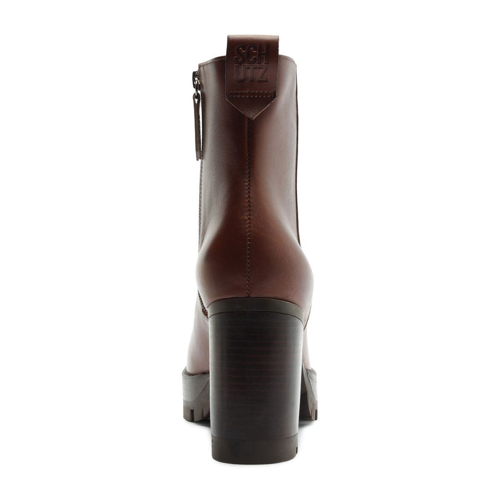 Rear view of 240 leather bootie in warm toffee showcasing the block heel and back zipper on a white background