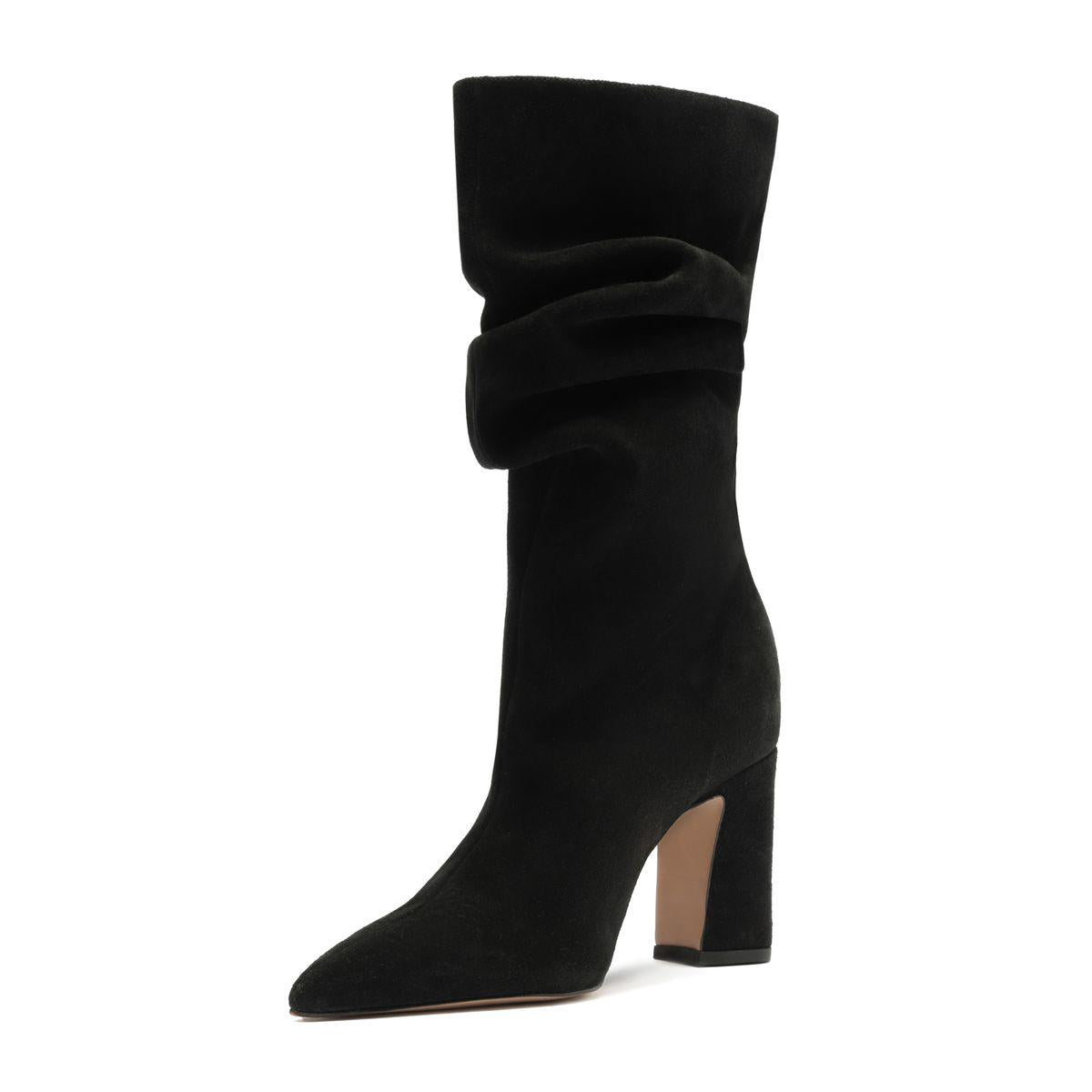 Side view of Harriet suede boot in black showcasing pointed toe, tall folded shaft, and block heel against white background