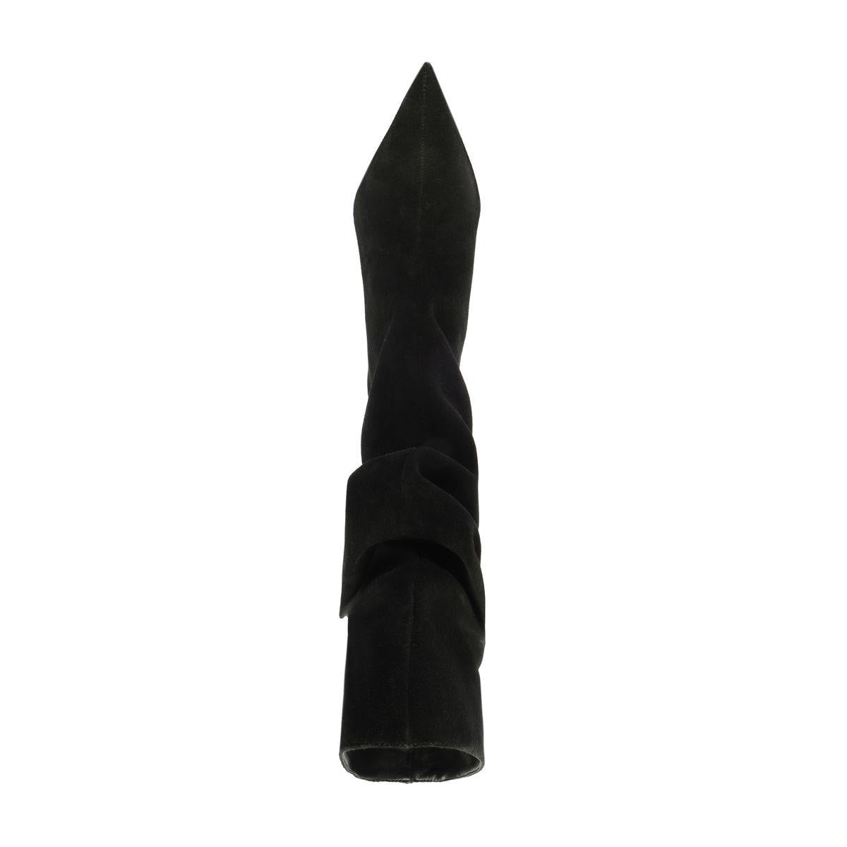 Close-up of Harriet suede boot in black showcasing its pointed shaft and gathered suede detail against a white background