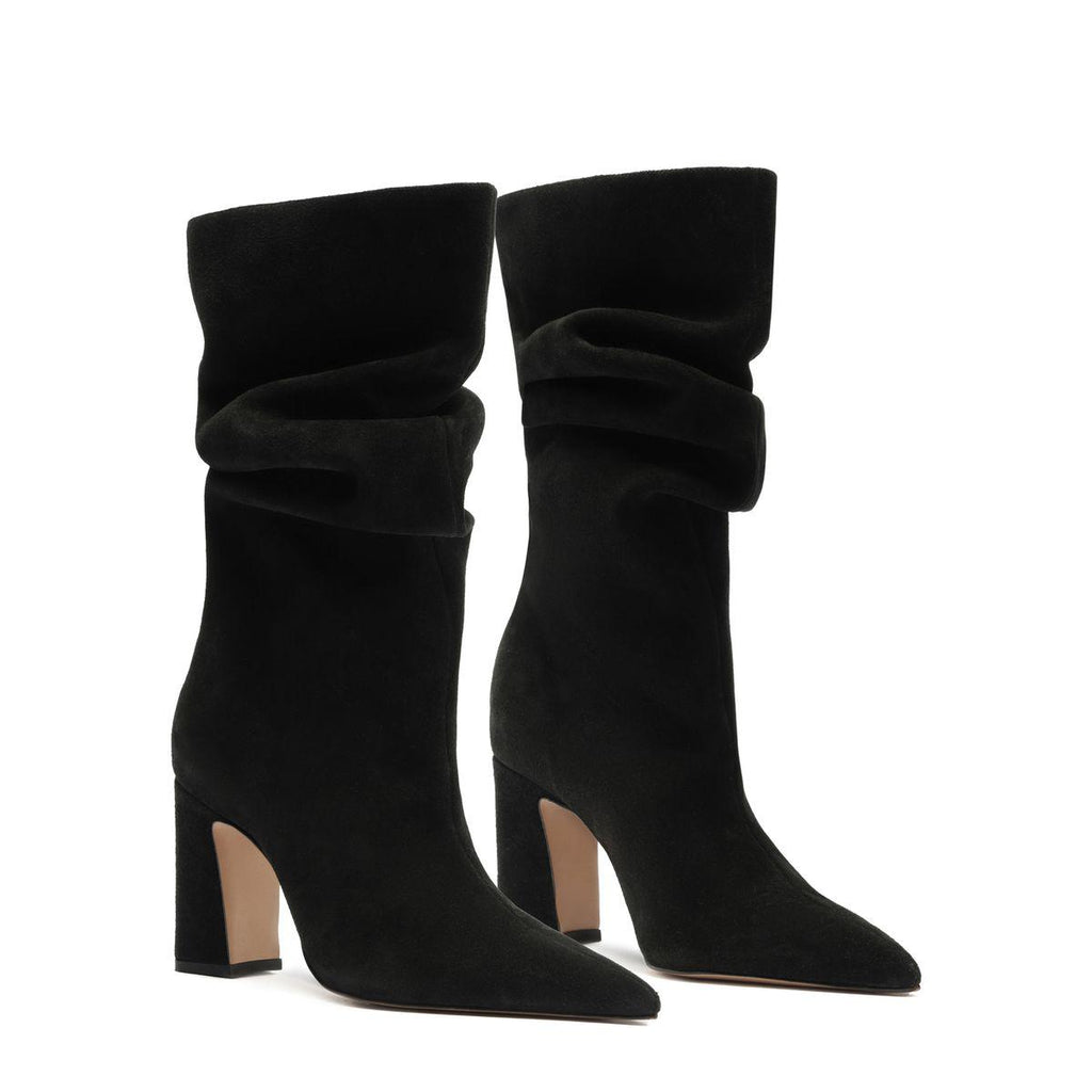 Front view of Harriet suede boots in black showcasing slouchy shafts and block heels on a white background