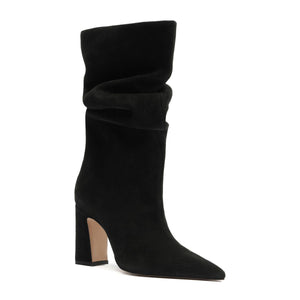Side view of Harriet Suede Boot in Black showcasing a slouchy shaft, pointed toe, and block heel on a white background