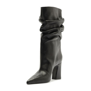 Side view of Harriet leather boot in black showcasing ruched shaft, pointed toe, and block heel on a white background