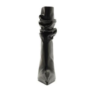 Front view of Harriet leather boot in black showcasing its slouchy shaft and pointed toe with a white background