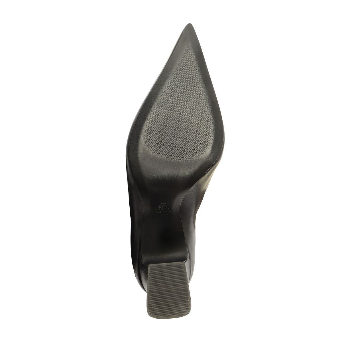 Bottom view of Harriet leather boot in black showcasing the sole and block heel against a white background